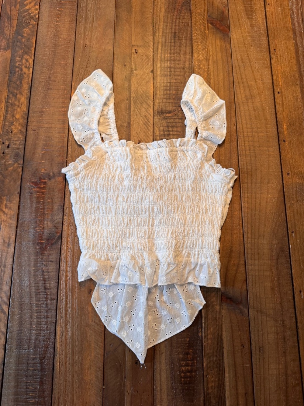 Kirious Los Angeles Eyelet Embroidery, Smocked Ruffle Bow Top.  Size Small
